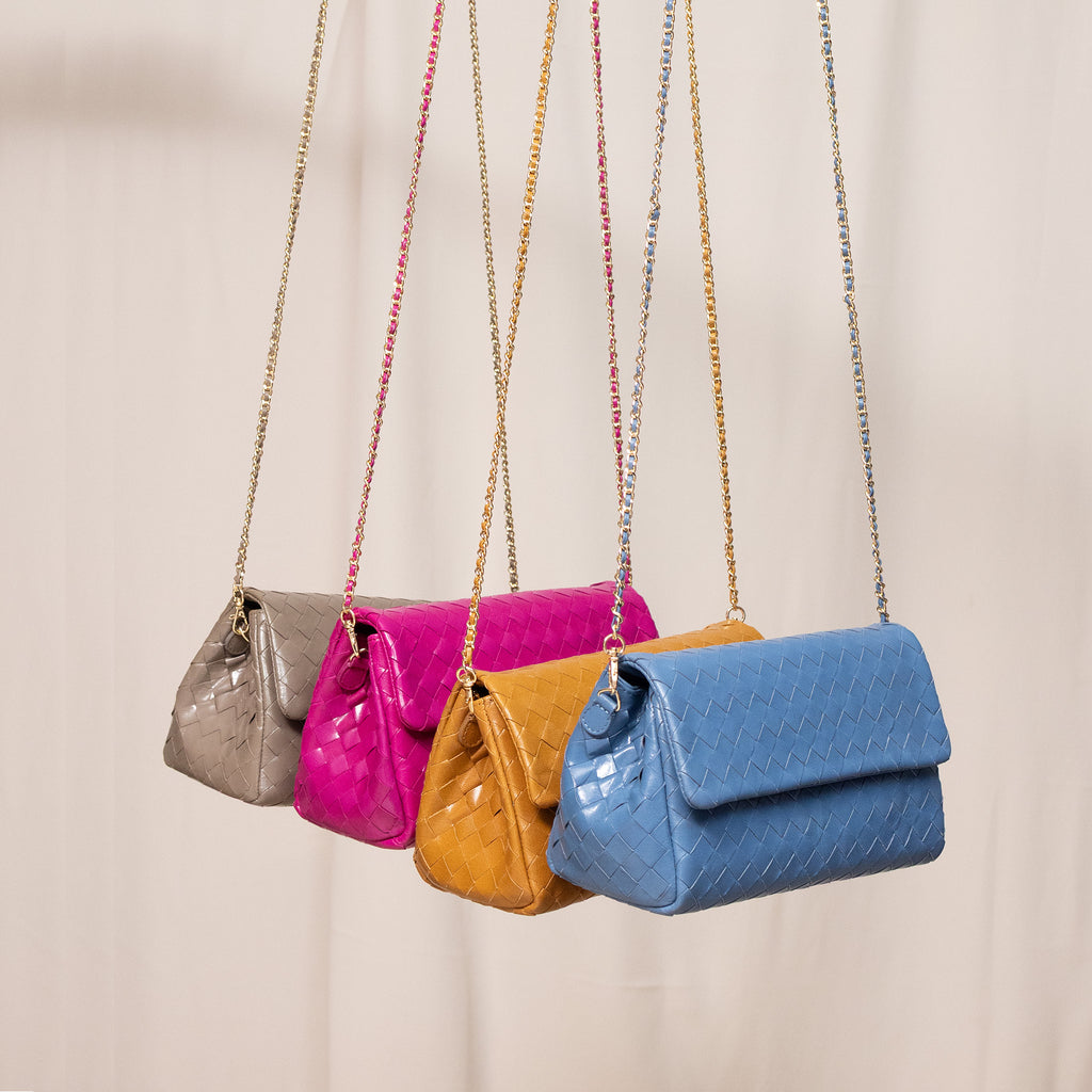 Soft leather sling bag in orchid shade